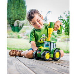 Child Playing with John Deere Build-a-Johnny Tractor MCE46655X000