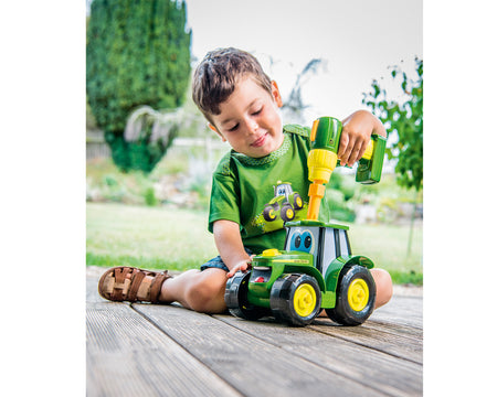 Child Playing with John Deere Build-a-Johnny Tractor MCE46655X000